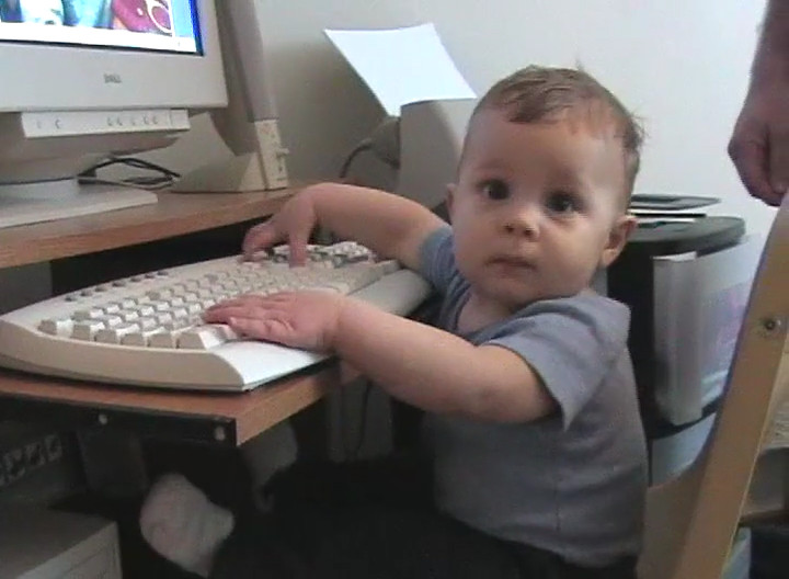 Baby Preston on the computer
